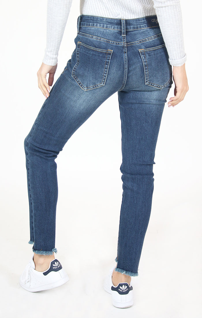 Medium Wash Frayed Hem Mid Rise Skinny Jeans